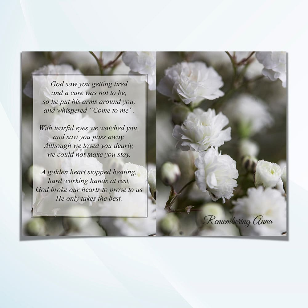 Unfolded white flowers memorial card showing full front and back floral design